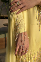Butter Bloom sleeve tassel detail