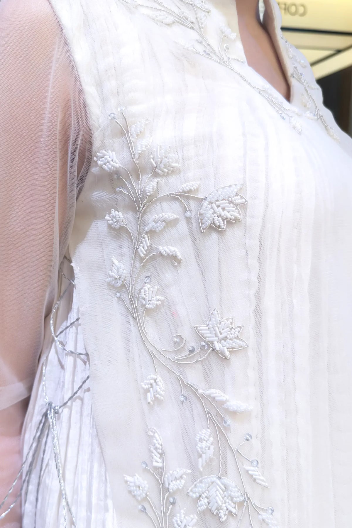 Noor tonal white hand embellishment detail